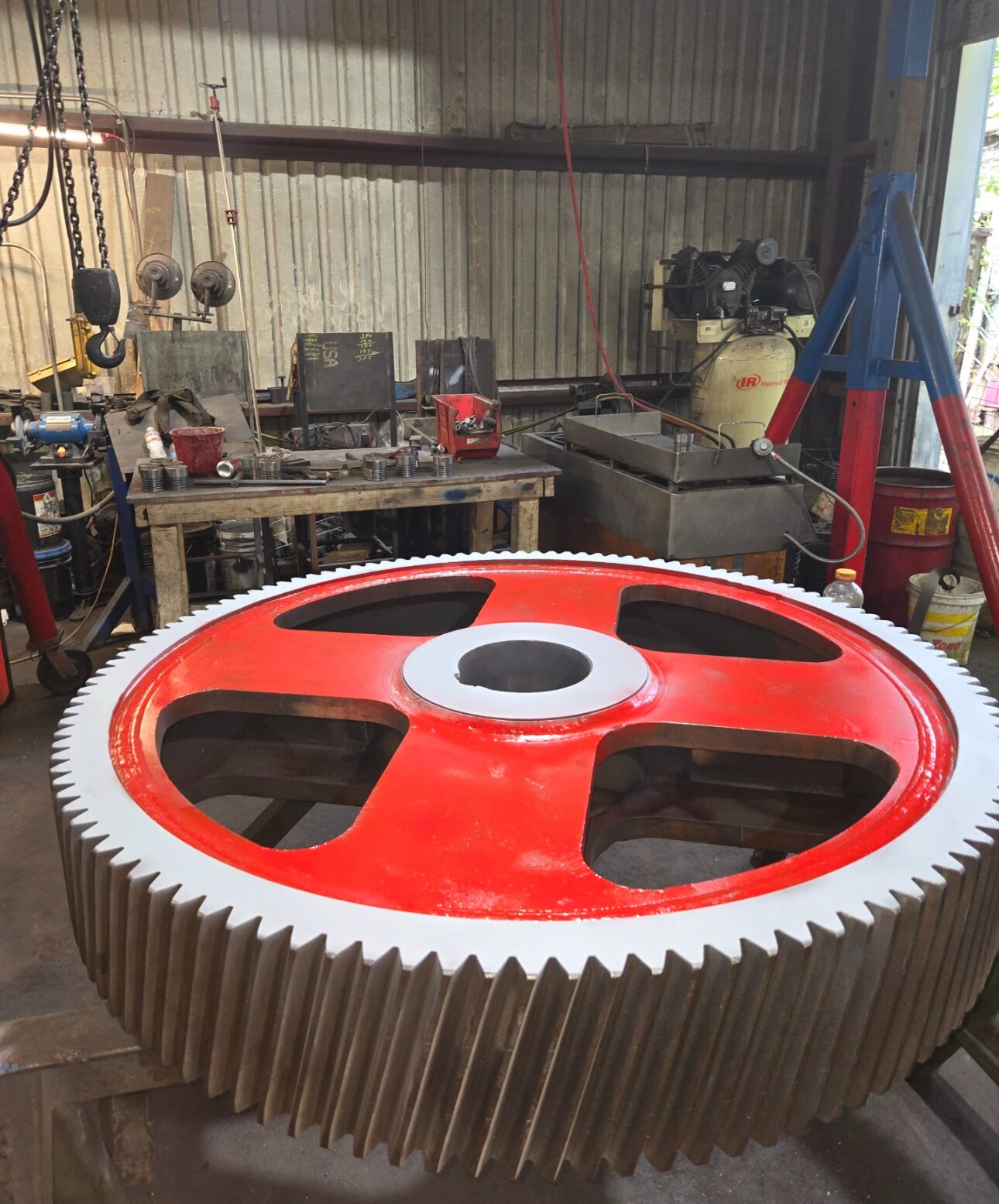 A large bull gear recut and painted, ready for service